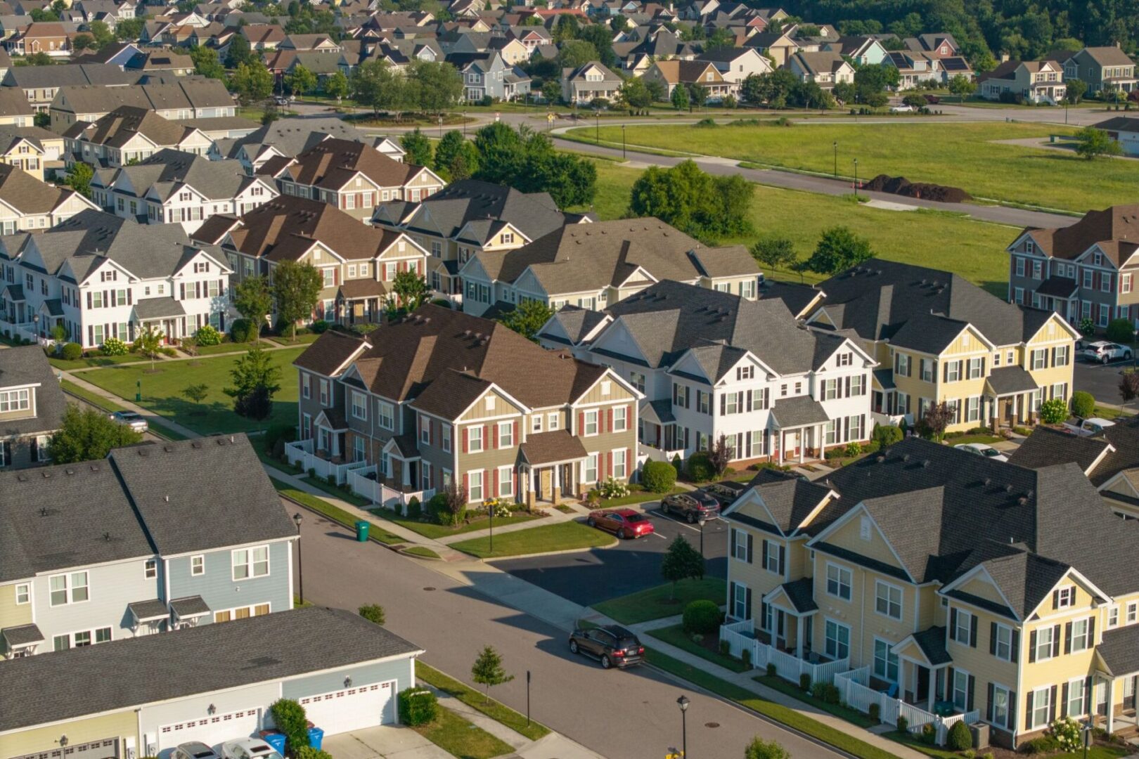 Suburban neighborhood with rows of houses.